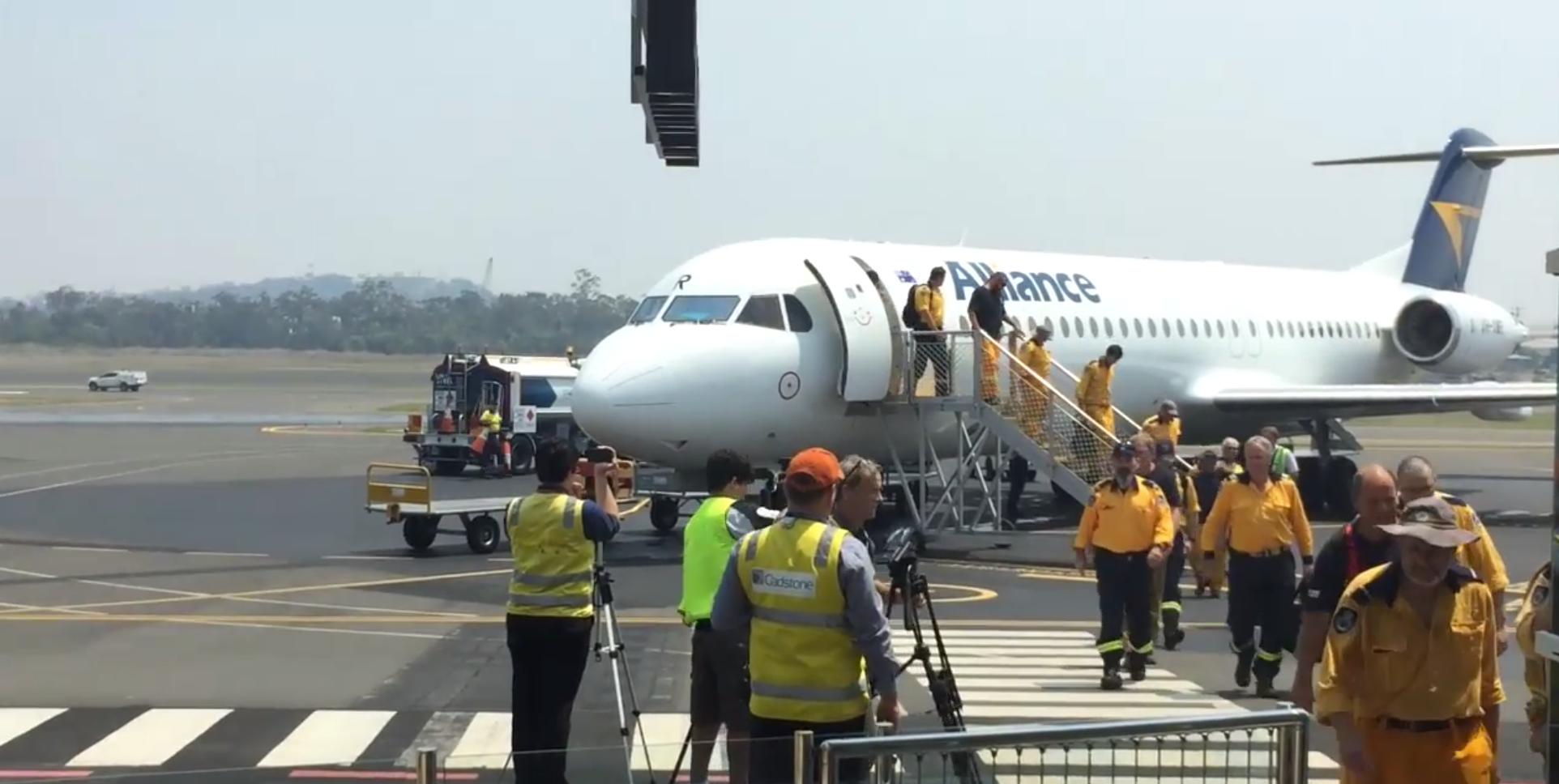 NSW firefighters arrive at the airport